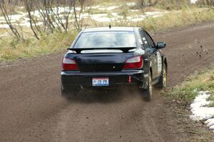 Pat Moro / Mike Rossey hang the back end out on their Subaru WRX on SS1, Herman.