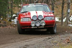 Mark Utecht / Rob Bohn throw their Ford Mustang through the first hard left-hander on SS1, Herman.