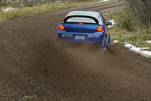 Cary Kendall / Scott Friberg sling gravel at a fast sweeping right on SS1 in their Dodge SRT-4.