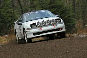 Chris Czyzio / Jeff Secor head through an uphill left near the start of Herman, SS1, in their Mitsubishi Eclipse GSX.