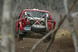 Jim Cox / Scott Parrott sling rocks in their Chevy S-10 through a fast left-hand sweeper near the start of SS1, Herman.