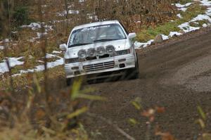 Larry Parker / Mandi Gentry through the opening corners of Herman, SS1, in their Mitsubishi Galant VR4.