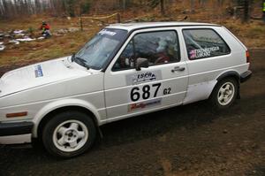 Chad Eixenberger / Jay Luikart VW GTI at speed in the opening corners of SS1.