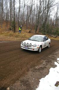 Chris Greenhouse / Matt Smith in their Plymouth Neon head uphill near the start of SS1, Herman.