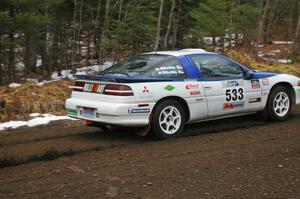 Paul Ritchie / Drew Ritchie head uphill through one of the first corners of Herman, SS1, in their Mitsubishi Eclipse GSX.