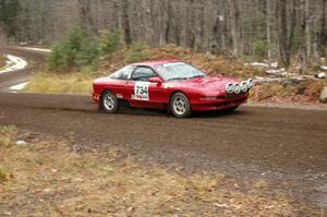Tom Diehl / Mike Rodriquez head uphill through the first curves of Herman, SS1, in their Ford Probe GT.