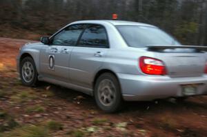 The 0 car Subaru WRX of Tom Nelson at the final corner of SS3, Echo Lake 1.