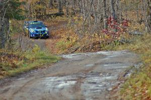 Travis Pastrana / Christian Edstrom slide through a left-hander on Gratiot Lake 1, SS8, in their Subaru WRX STi.