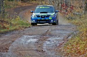 Ken Block / Alex Gelsomino Subaru WRX STi heads uphill to the finish of SS8, Gratiot Lake 1.