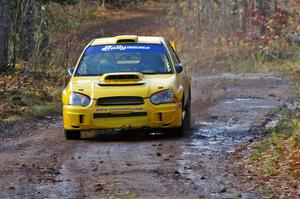 Tim O'Neil / Martin Headland head uphill to the finish of SS8, Gratiot Lake 1, in their Subaru WRX STi.