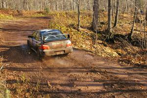 Jonathan Bottoms / Carolyn Bosley set up for the final corner of Gratiot Lake 1, SS8, in their Subaru WRX STi.