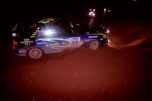 The Ken Block / Alex Gelsomino Subaru WRX STi goes through an uphill left near the finish of Echo Lake 2.