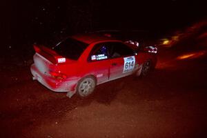 The Piotr Wiktorczyk / John Nordlie Subaru Impreza goes through an uphill left near the finish of Echo Lake 2.