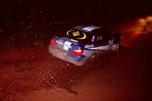 The Kyle Sarasin / Stuart Sarasin Subaru WRX goes through an uphill left near the finish of Echo Lake 2.