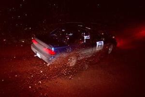 The Erick Murray / Nicky Nelson Subaru Legacy goes through an uphill left near the finish of Echo Lake 2.