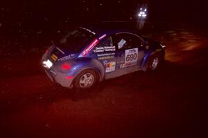 The Kenny Bartram / Dennis Hotson VW New Beetle goes through an uphill left near the finish of Echo Lake 2.