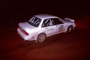 The Larry Parker / Mandi Gentry Mitsubishi Galant VR-4 goes through an uphill left near the finish of Echo Lake 2.