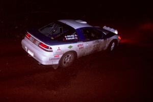 The Paul Ritchie / Drew Ritchie Mitsubishi Eclipse GSX goes through an uphill left near the finish of Echo Lake 2.