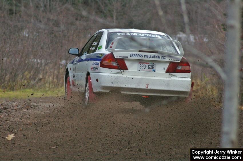 Chris Gilligan / Joe Petersen sling gravel far in their Mitsubishi Lancer Evo IV on Herman, SS1.