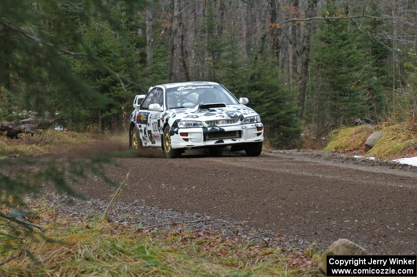 Dave Anton / Robbie Durant at speed in their Subaru Impreza on SS1, Herman.