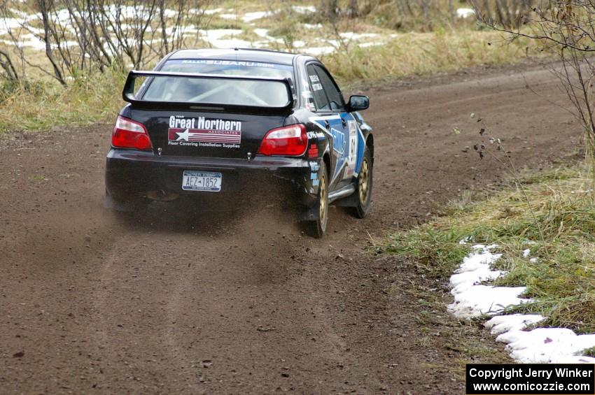 Jonathan Bottoms / Carolyn Bosley kick the back end around and reapply the power on their Subaru WRX STi on SS1, Herman.