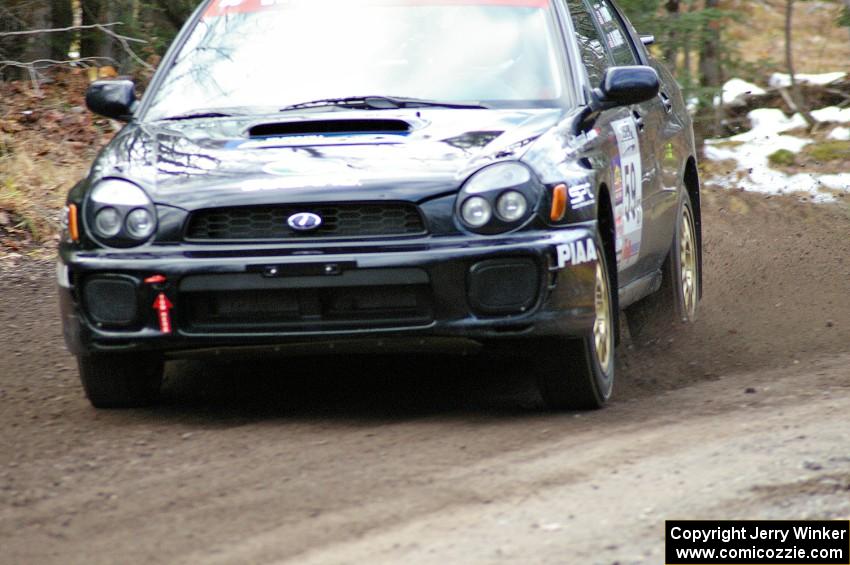 Pat Moro / Mike Rossey drift their Subaru WRX at the first hard left on SS1, Herman.