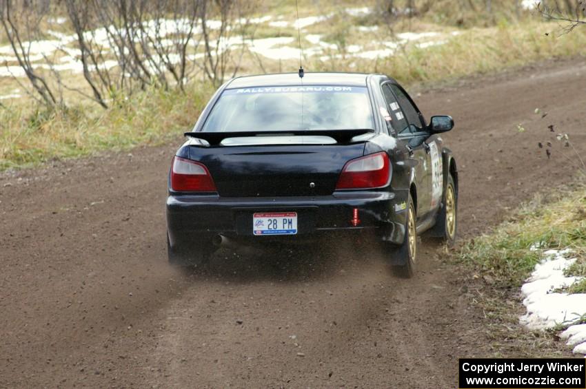 Pat Moro / Mike Rossey hang the back end out on their Subaru WRX on SS1, Herman.