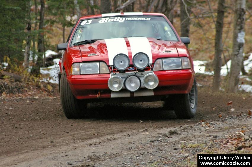 Mark Utecht / Rob Bohn throw their Ford Mustang through the first hard left-hander on SS1, Herman.