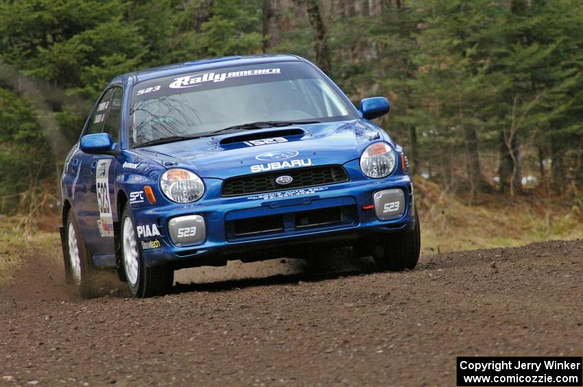 Travis Hanson / Terry Hanson drift through a left-hander near the start of SS1, Herman, in their Subaru WRX.