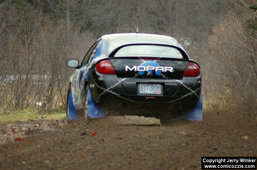 Bruce Davis / Jimmy Brandt kick the tail out at a left-hander on SS1 in their Dodge SRT-4. They were an early DNF.