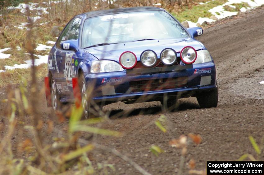 James Robinson / Andrew Jessup head uphill through the first corners of Herman, SS1, in their Honda Civic Si.