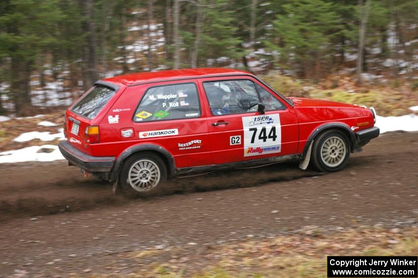 Paul Koll / Matt Wappler drift their VW GTI through a fast uphill left on Herman, SS1, near the start of the stage.