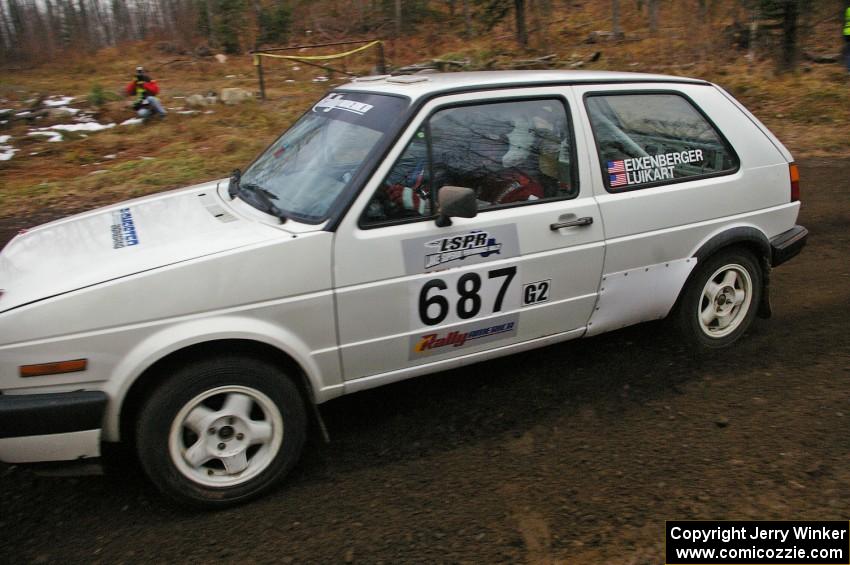 Chad Eixenberger / Jay Luikart VW GTI at speed in the opening corners of SS1.