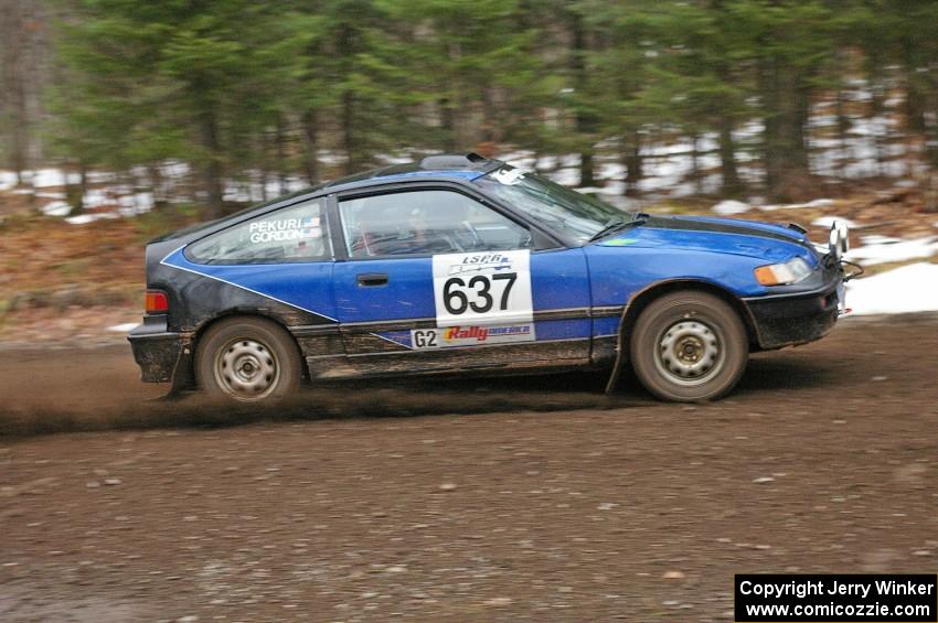 Chris Gordon / Matt Pekuri blast uphill through the opening corners of SS1, Herman, in their Honda CRX.