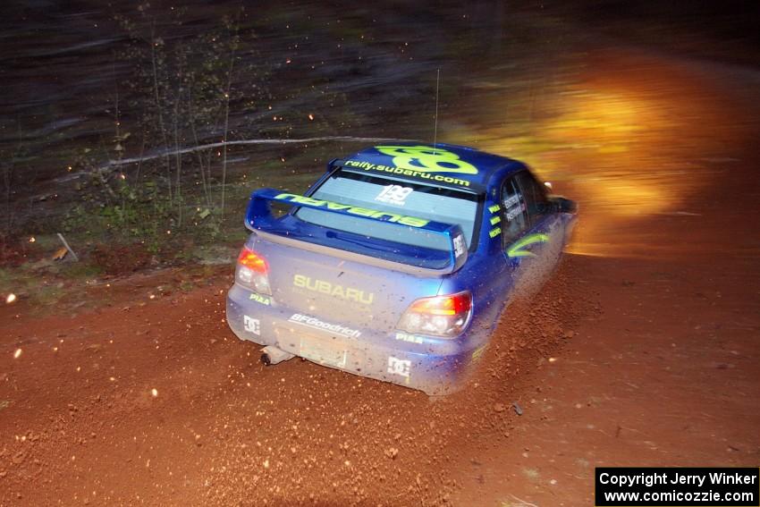 Travis Pastrana / Christian Edstrom sling gravel at the final corner of SS3, Echo Lake 1, in their Subaru WRX STi.