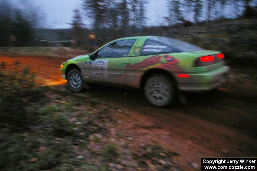 Doug Shepherd / Pete Gladysz at speed at dusk through the final corner of SS3, Echo Lake 1, in their Mitsubishi Eclipse.