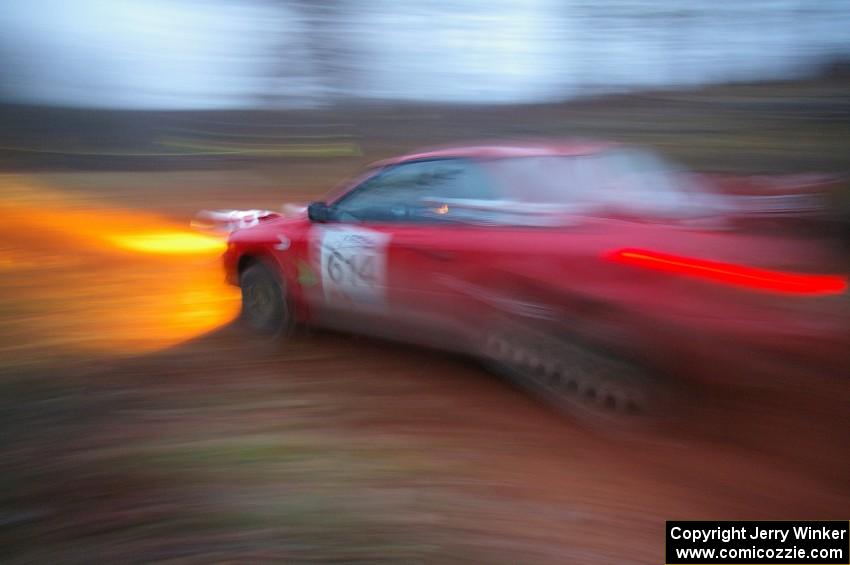 Piotr Wiktorczyk / John Nordlie	at the final corner of Echo Lake 1, SS3, in their Subaru Impreza.