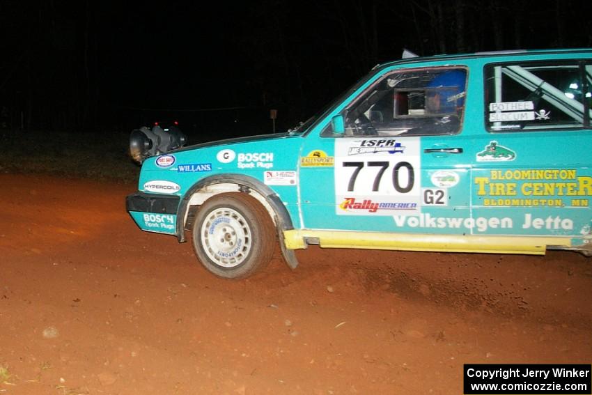 Miles Bothee / Ben Slocum VW Jetta at speed at the final corner of Echo lake 1, SS3.