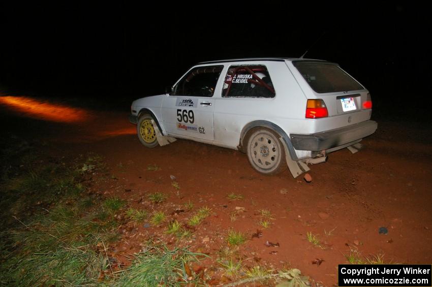 John Hruska / Carl Seidel at speed through the final corner of Echo Lake 1, SS3, in their VW GTI.