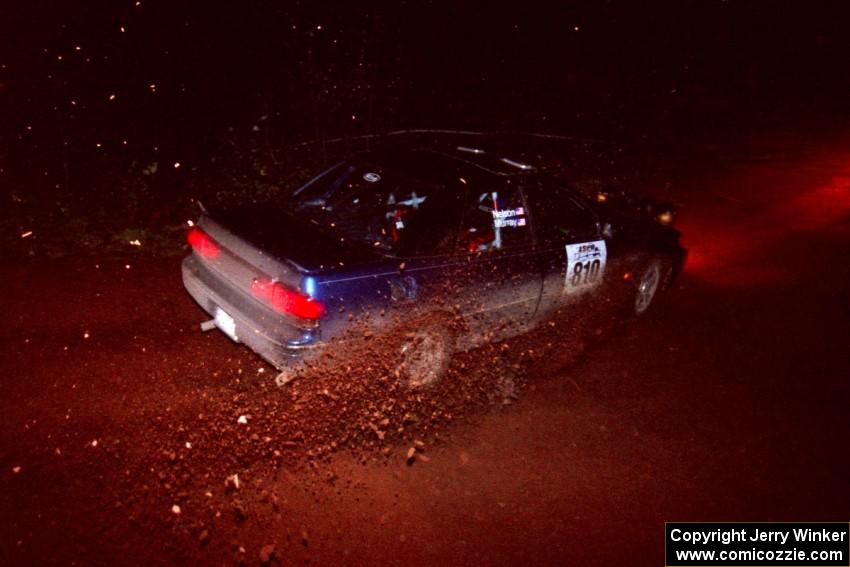 The Erick Murray / Nicole Nelson Subaru Legacy goes through an uphill left near the finish of Echo Lake 2.