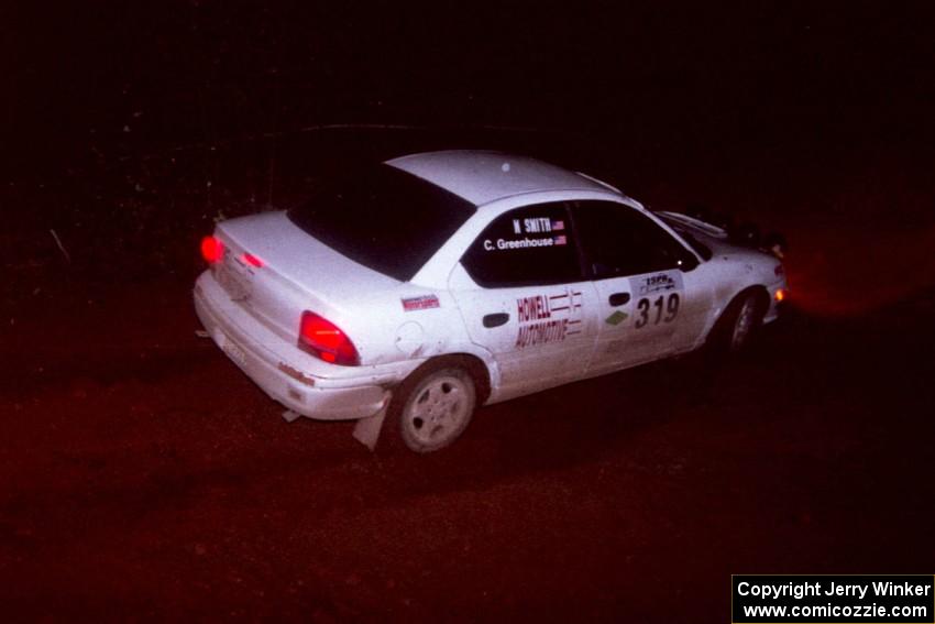 The Chris Greenhouse / Matt Smith Plymouth Neon goes through an uphill left near the finish of Echo Lake 2.