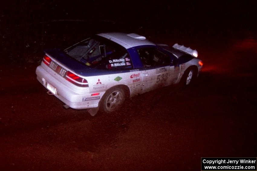 The Paul Ritchie / Drew Ritchie Mitsubishi Eclipse GSX goes through an uphill left near the finish of Echo Lake 2.