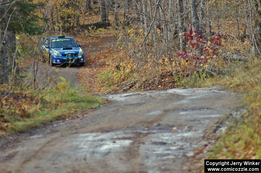 Travis Pastrana / Christian Edstrom slide through a left-hander on Gratiot Lake 1, SS8, in their Subaru WRX STi.
