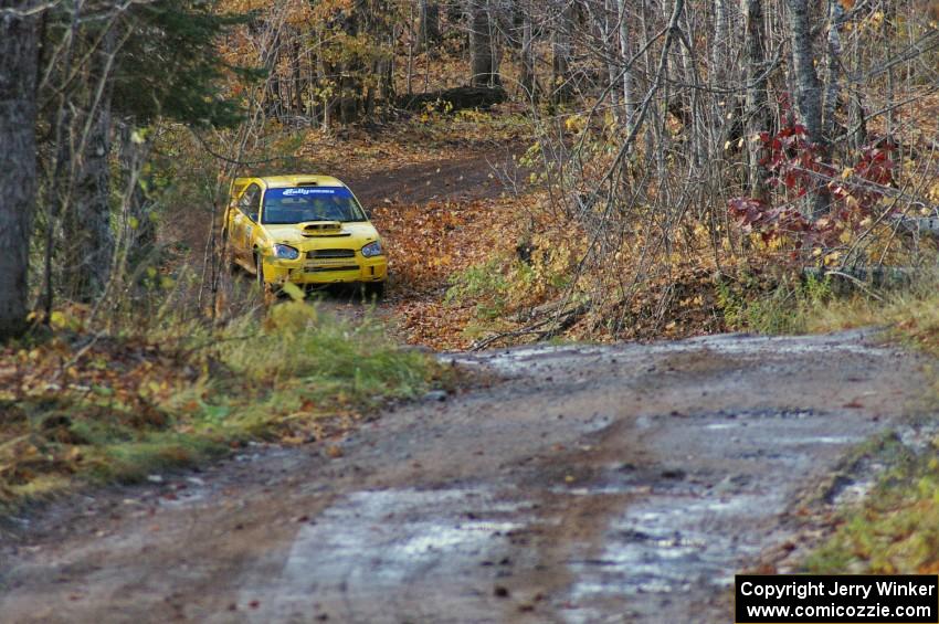 Tim O'Neil / Martin Headland drift through a corner before the final uphill on Gratiot Lake 1, SS8, in their Subaru WRX STi.