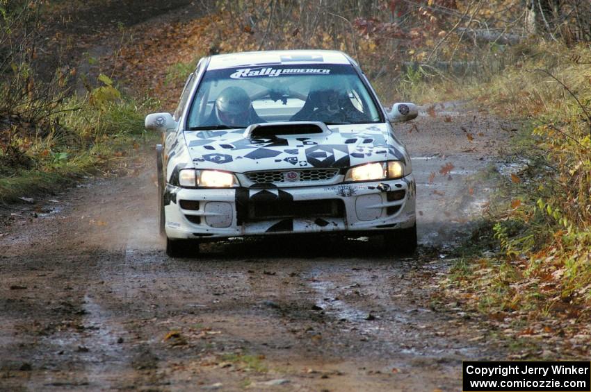 Dave Anton / Robbie Durant Subaru Impreza heads uphill into the final corner of Gratiot Lake 1, SS8.