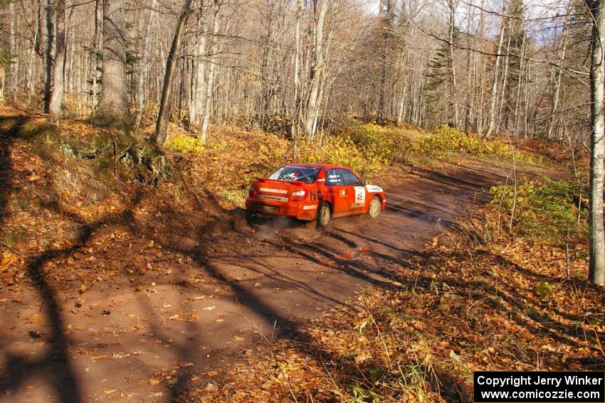 Matthew Johnson / Kim DeMotte at the final corner of Gratiot Lake 1, SS8, in their Subaru WRX.