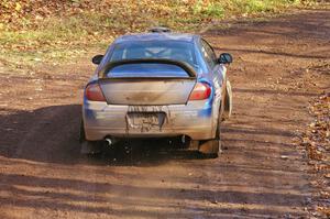 Cary Kendall / Scott Friberg take an easy approach to the final greasy corner of SS8, Gratiot Lake 1, in their Dodge SRT-4.