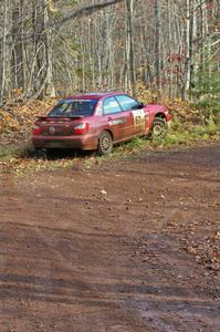 Bryan Pepp / Jerry Stang carried too much speed into the final greasy corner of SS8, Gratiot Lake 1, in their Subaru WRX.