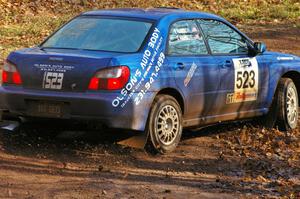 Travis Hanson / Terry Hanson Subaru WRX drifts through the final corner of SS8, Gratiot Lake 1.