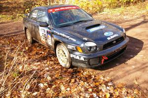 Pat Moro / Mike Rossey at speed at the final corner of SS8, Gratiot Lake 1, in their Subaru WRX.